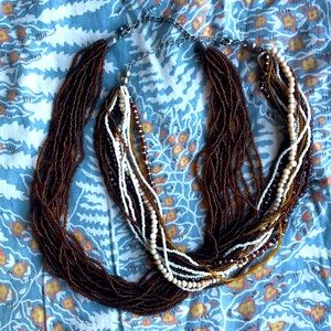 Multi strand necklaces